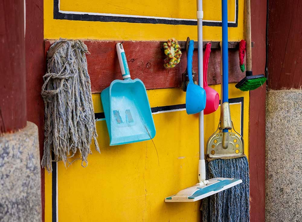 Old mop and other cleaning tools that need replacing