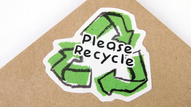 Recycling sign highlighting proper disposal of cleaning product containers