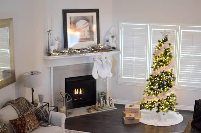 Cozy living room with holiday decorations arranged neatly, showing how to store seasonal decor with style and order