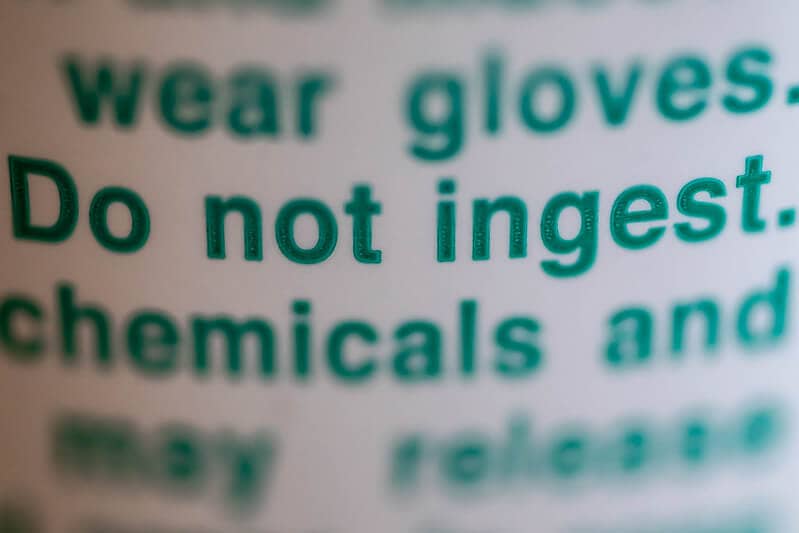 Warning label highlighting safe cleaning chemical storage instructions
